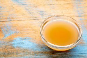 apple cider vinegar in bowl with mother