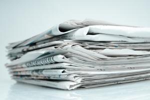 stack of newspapers available for reuse