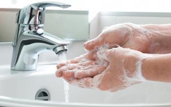 creating greywater by washing hands with soap